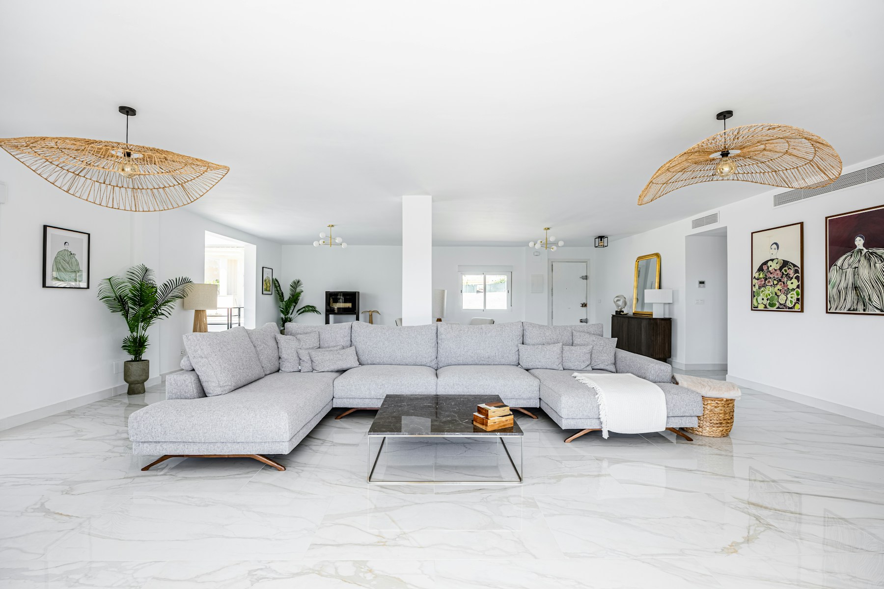 Light sectional sofa in a spacious modern room